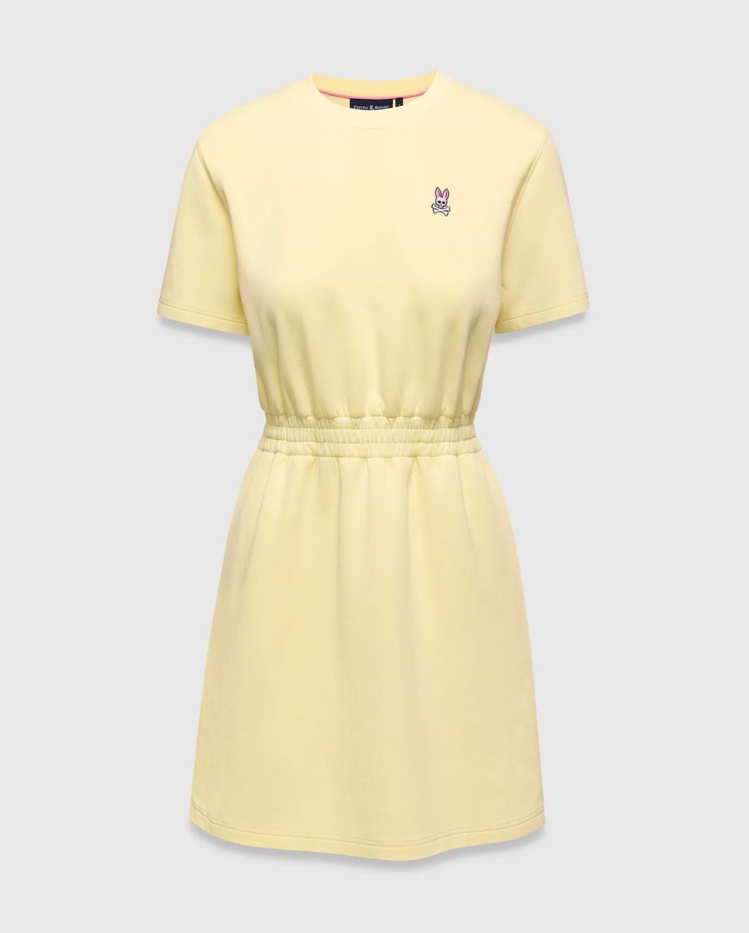 Womens Penelope Dress, a light yellow jersey knit dress with a relaxed fit, crew neck, short sleeves, and an elasticated waist. Features a small pink and white embroidered Psycho Bunny skull logo on the left chest.