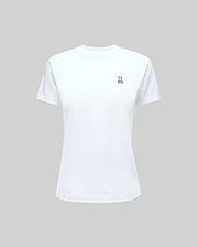 The Psycho Bunny WOMENS CLASSIC TEE - WT0200005 is made from 100% Pima cotton, featuring a rib knit crew neck and a small embroidered peace sign on the left chest. Shown on a light gray background.