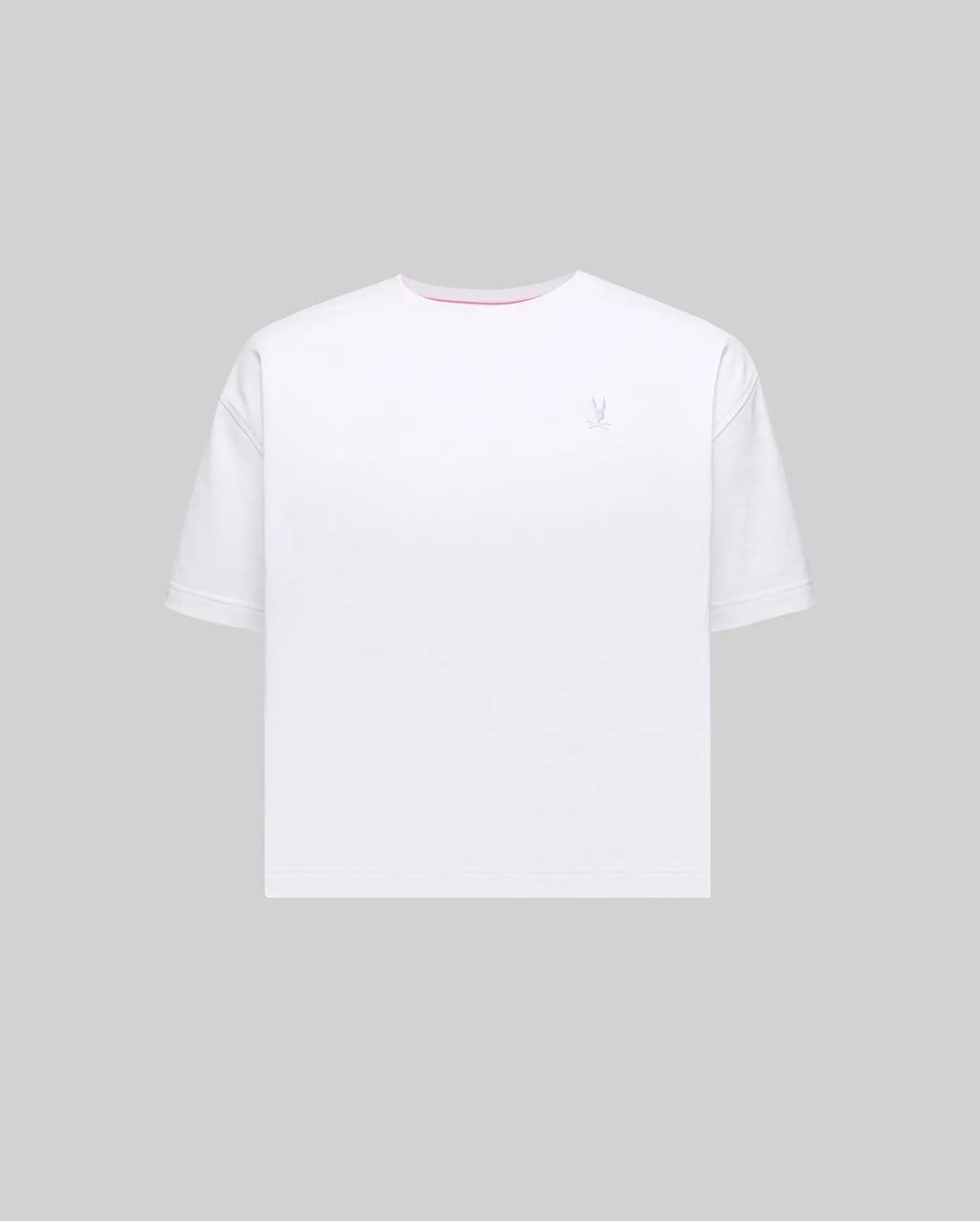 Women's Camille Oversized Fit Tee, premium white jersey with a small embroidered silver-blue Psycho Bunny skull logo on the left chest and a pink inner neckline.