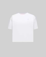 Women's Camille Oversized Fit Tee, premium white jersey with a small embroidered silver-blue Psycho Bunny skull logo on the left chest and a pink inner neckline.