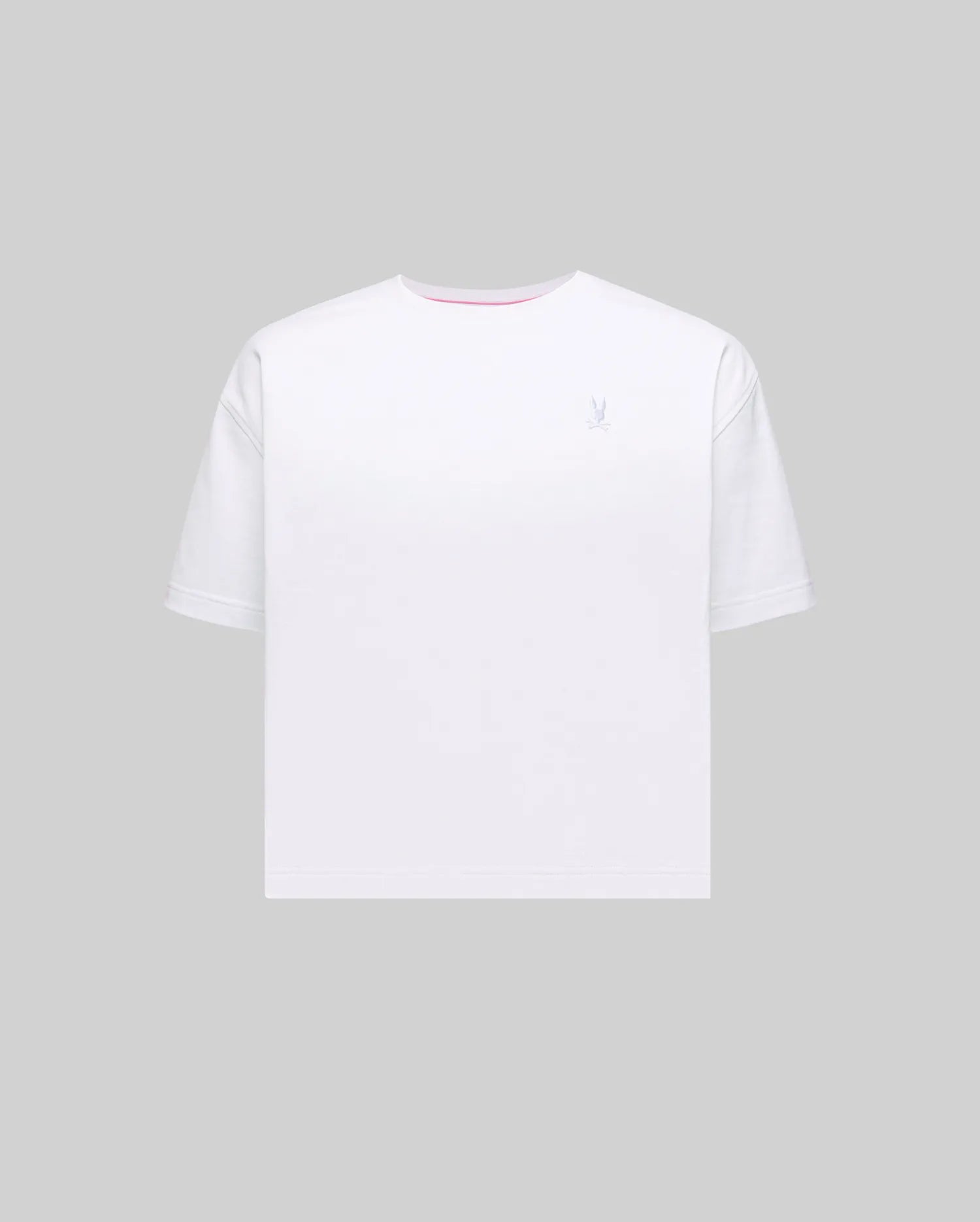 Women's Camille Oversized Fit Tee, premium white jersey with a small embroidered silver-blue Psycho Bunny skull logo on the left chest and a pink inner neckline.