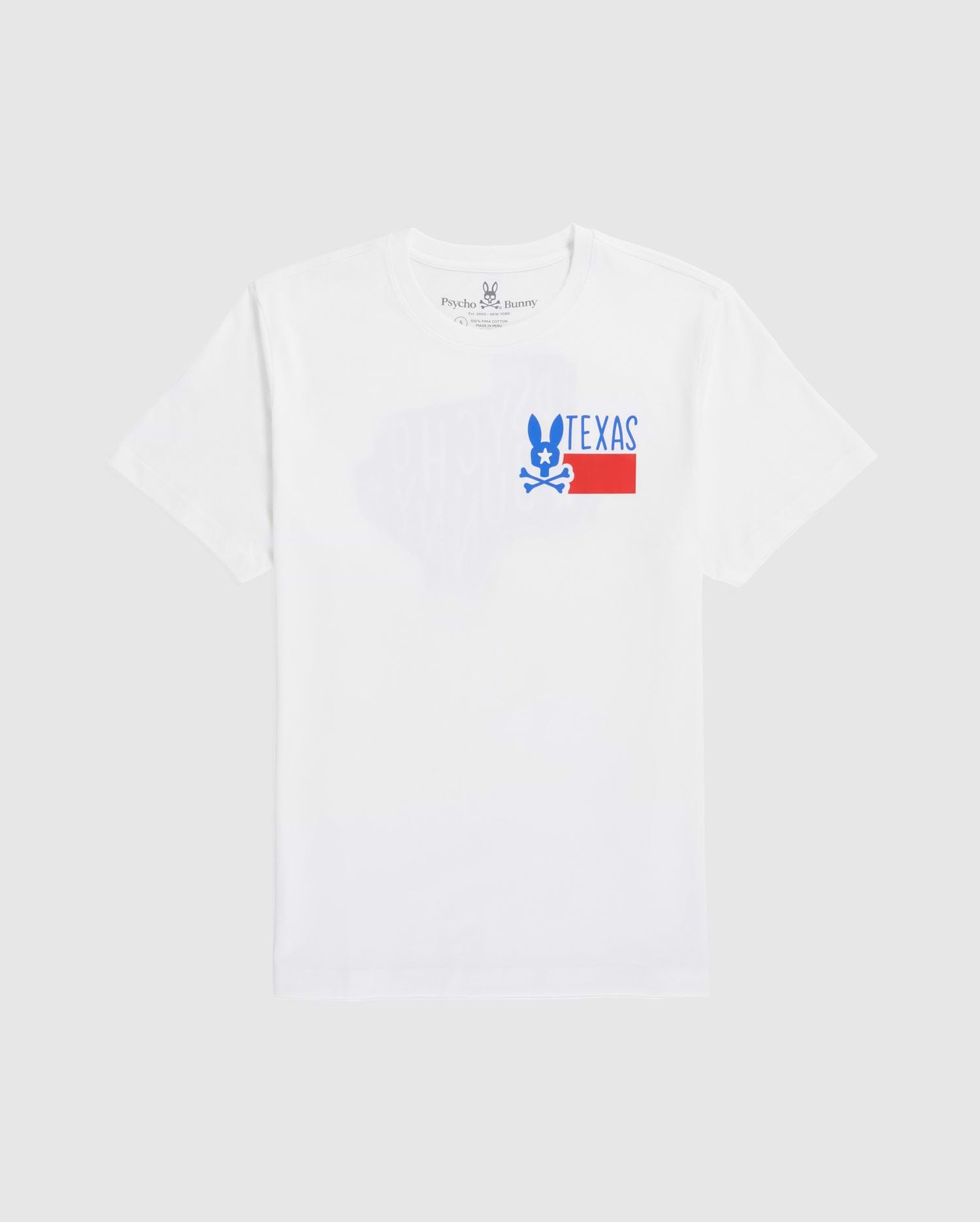 A plain white men's Psycho Bunny Texas tee laid flat, featuring a graphic print with the word "TEXAS" in block letters and a stylized blue and red design underneath, positioned slightly off-center towards the left.