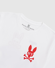 The MENS NEW YORK TEE - B6U554W1PC featuring a red bunny skull and crossbones logo with "NY" written on the bunny's head. Crafted from Pima cotton jersey, the shirt’s brand name, "Psycho Bunny," is printed on the inside neckline tag in black text, accompanied by a small bunny logo above it.