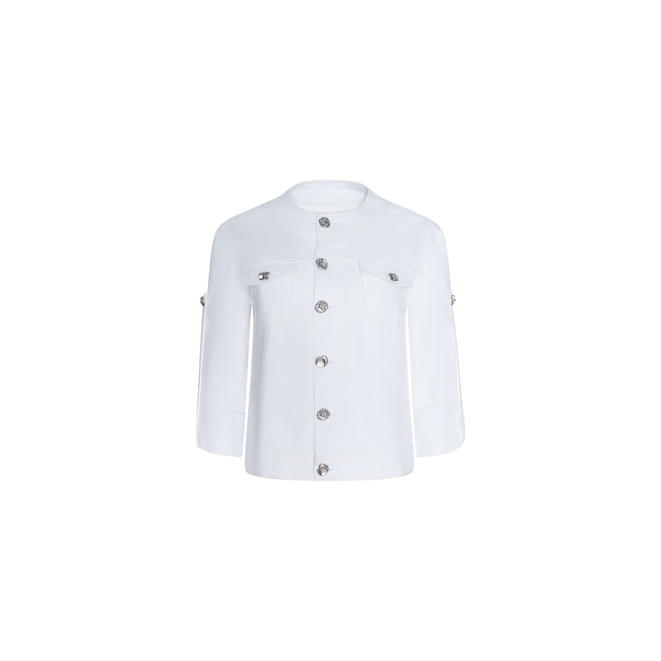 The Anouk Jean Jacket is a white, long-sleeve, collarless denim jacket featuring silver buttons down the front and on two chest pockets. Shown against a plain white background, it is designed in a relaxed fit for effortless style.