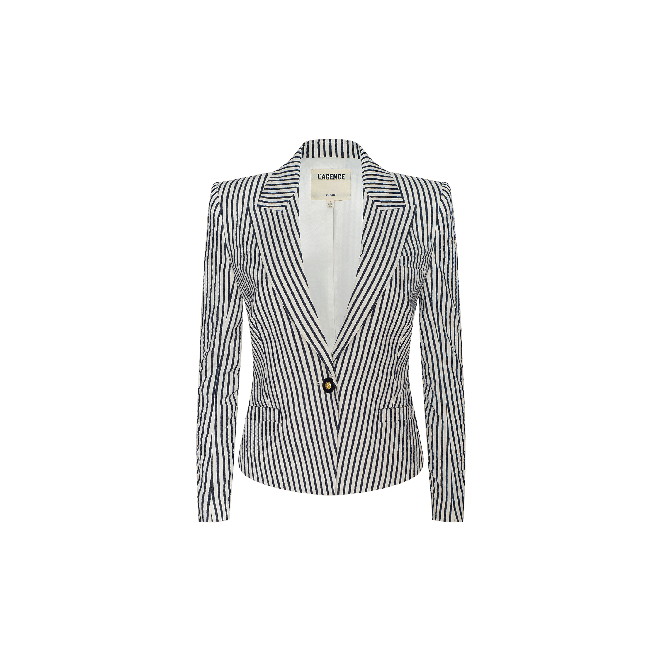 The Misa Seersucker Blazer, featuring black and white vertical stripes, notched lapels, a single front button, and long sleeves, is displayed on a plain white background. This tailored women’s blazer combines classic seersucker style with contemporary detailing for a modern look.