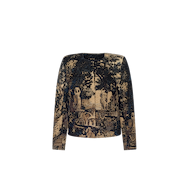 The Lian Tapestry Jacket is a long-sleeved, round-neck design showcasing a Flemish tapestry-style print inspired by scenic outdoor landscapes with trees and classical statues on a dark background, reminiscent of works found in the Rijksmuseum.