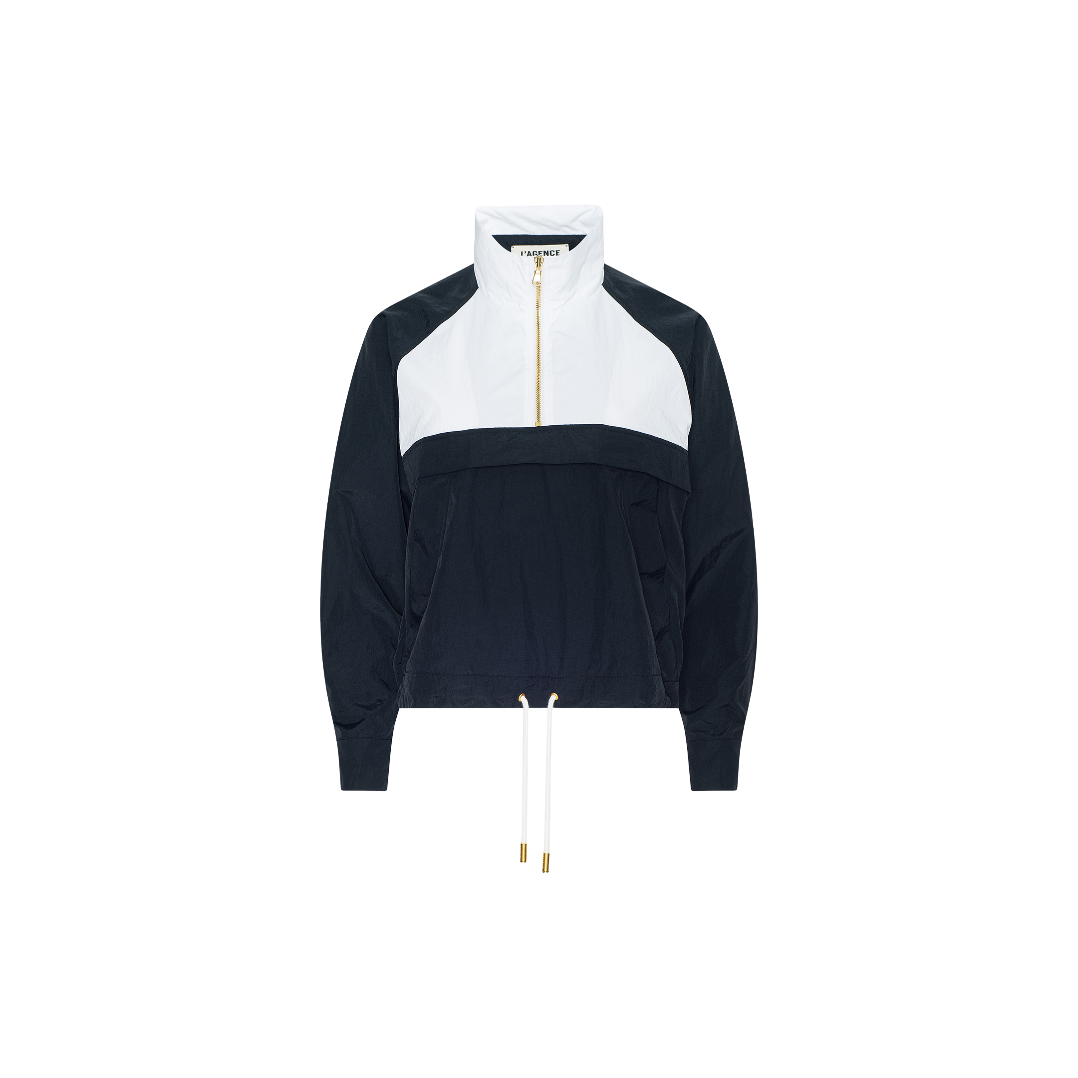 The Vex Cropped Windbreaker is a black and white long-sleeve activewear jacket featuring a front zip, high collar, and drawstring hem, shown against a plain white background. This windbreaker combines style with functionality.