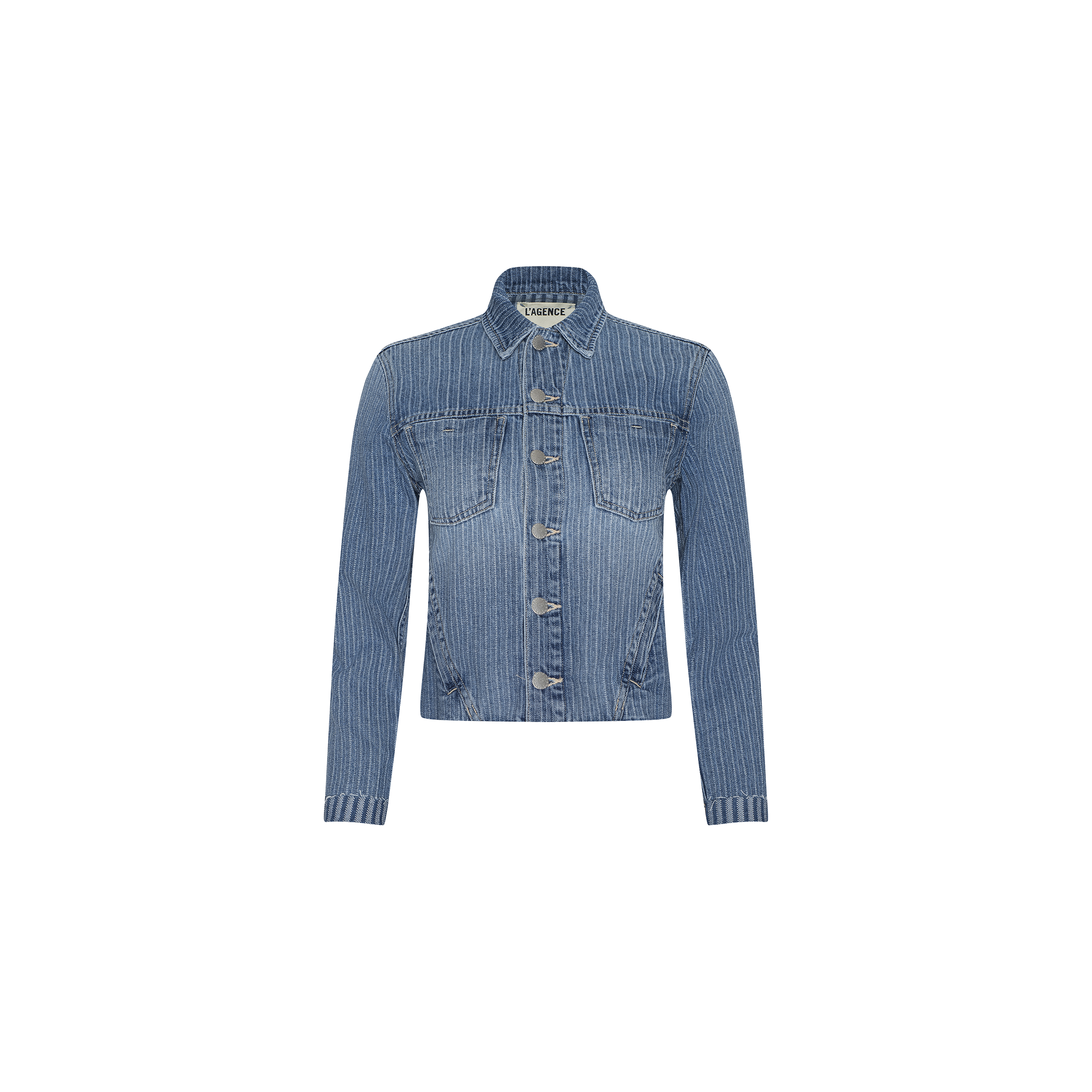 The Janelle Jean Jacket, an all-cotton denim piece in blue with a collar, front button closure, and vertical white pinstripes, is displayed against a plain white background. This slim fit jacket offers a modern take on classic style.