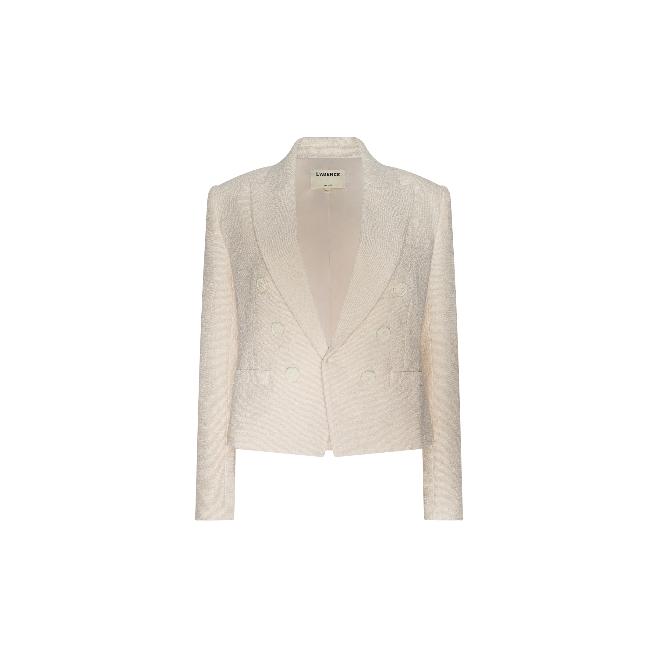 The Brooke Tweed Blazer is a cream-colored, double-breasted women’s blazer featuring long sleeves, two front pockets, and a notched lapel, shown against a plain white background.