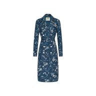 The Bradley Linen Trench Coat is a blue, double-breasted trench coat featuring a belted waist and white floral print—this classic outer layer blends elegance and versatility, shown against a plain white background.