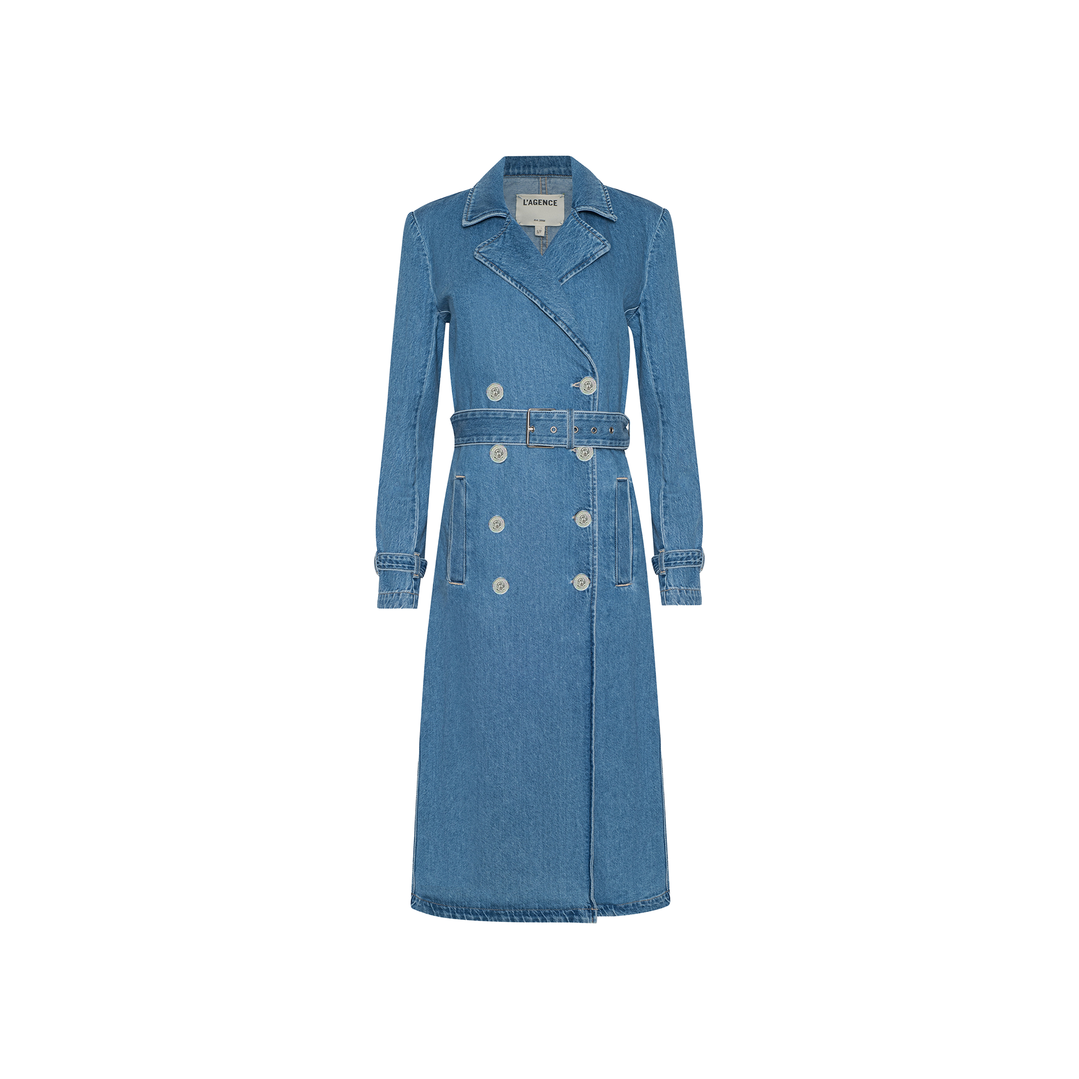 The Bradley Trench Coat is a long blue denim trench coat in a medium wash, featuring double-breasted buttons, a notched collar, a belted waist, and front pockets. Crafted from lightweight denim for comfort and style, it is displayed on a plain white background.
