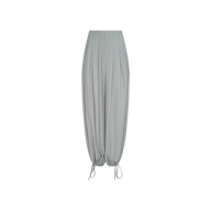 The Ysola Pant is an ultra-high-rise trouser in light gray, featuring a loose, wide-leg fit and adjustable drawstrings at the ankle cuffs, showcased against a plain white background.