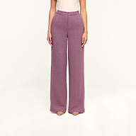 A person wearing the Livvy Straight-Leg Trouser in mauve and beige shoes stands against a plain, off-white background, with only the lower half of their body visible.