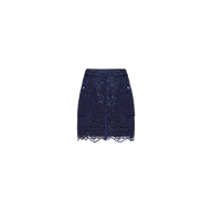 The Riven Lace Mini Skirt in midnight blue showcases a flattering A-line mini silhouette with delicate floral lace, front pockets, button details, and a scalloped hem, displayed on a plain white background.