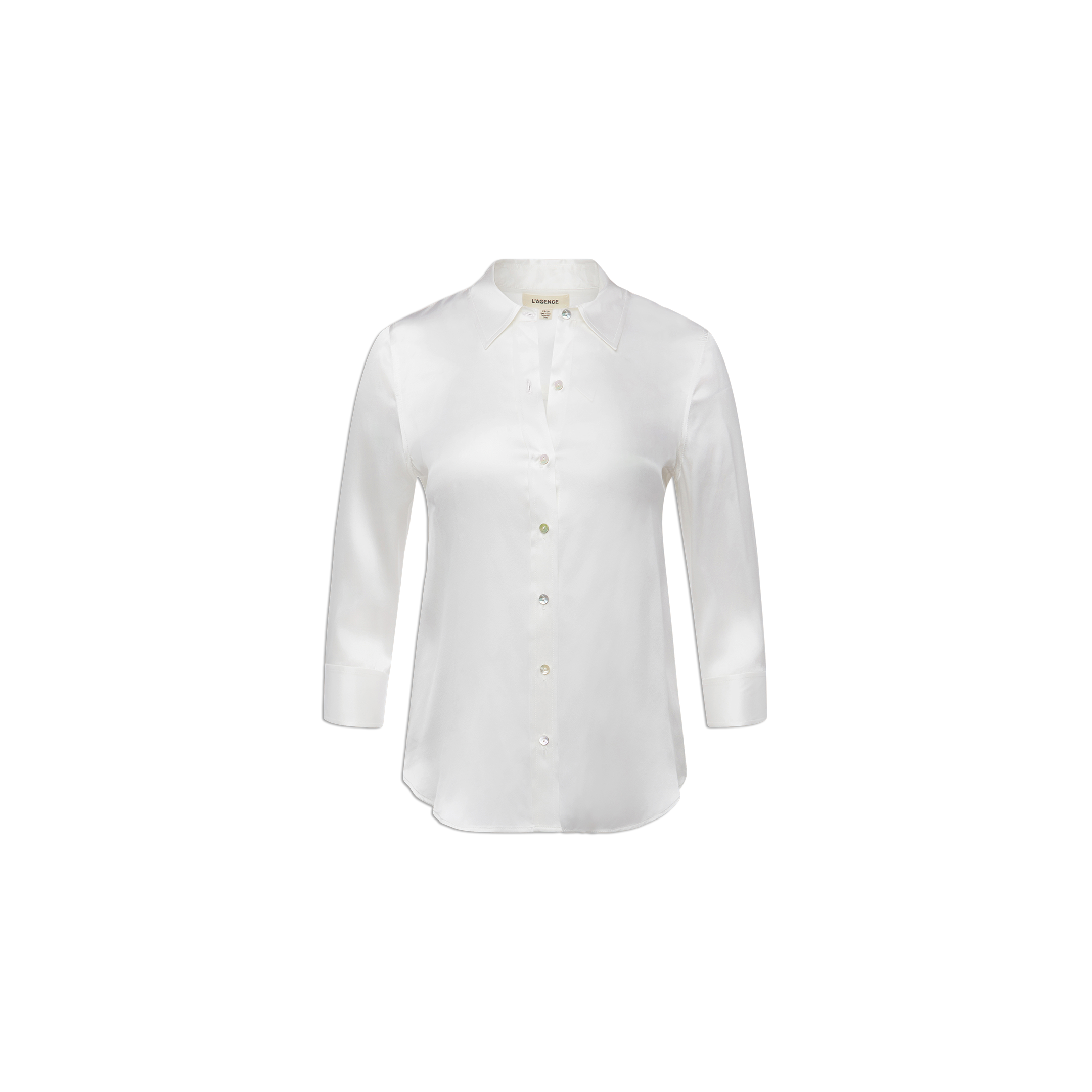 The Dani Silk Blouse, crafted from luxurious ivory charmeuse silk, features long sleeves, a classic collar, and a button-down front. Displayed on a plain white background, this elegant blouse is designed with a slightly curved hem for a timeless silhouette.