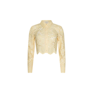 The Seychelle Cropped Eyelet Blouse is a light yellow, long-sleeve sheer poplin lace blouse featuring a collared neckline, cropped cut, and scalloped hem, displayed on a plain white background.