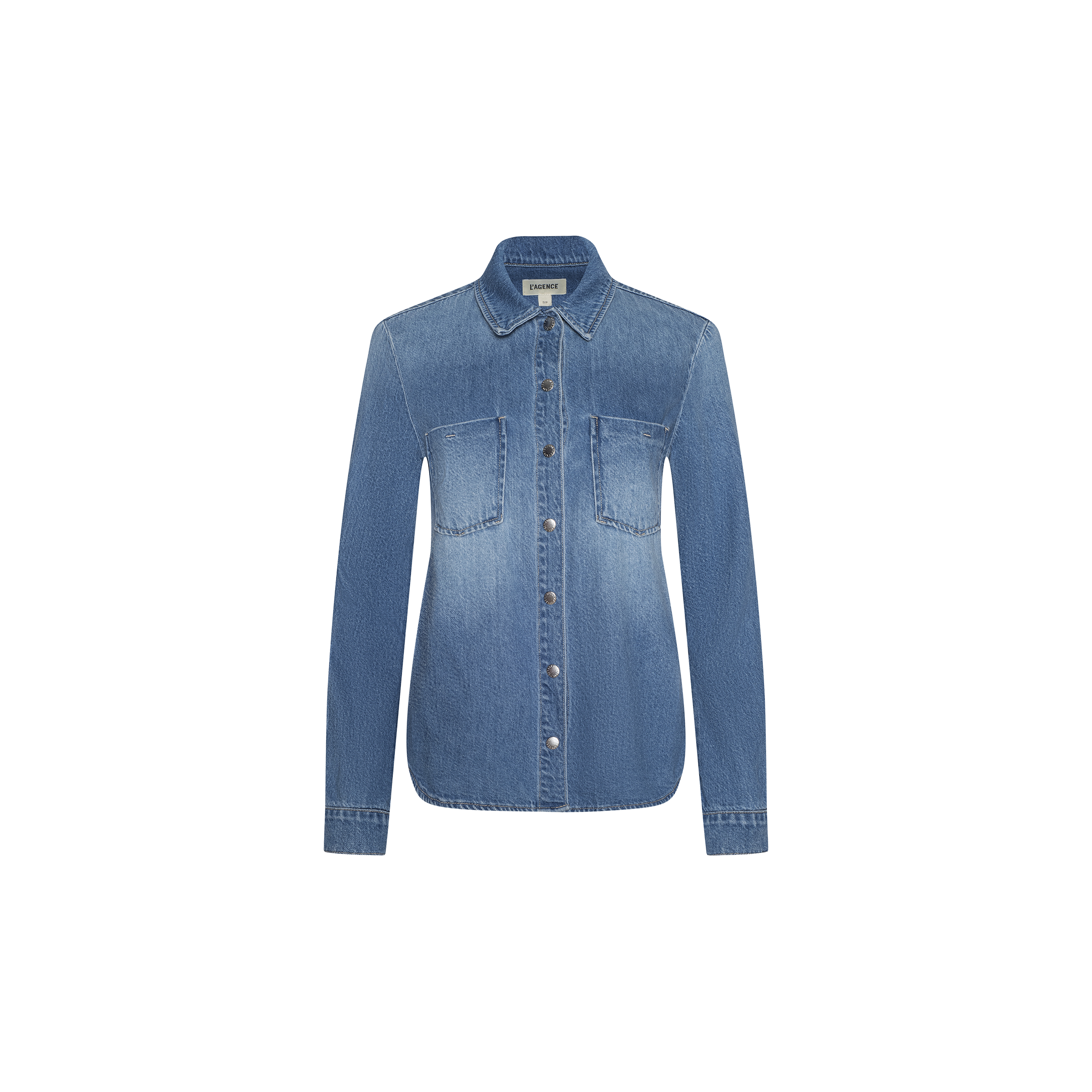 Front view of the Isla Shirt by L’AGENCE, a long-sleeve lightweight denim shirt featuring a collar, button-down front, and two chest pockets in an aged indigo wash, displayed on a plain white background.