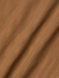 Close-up of light brown Kalea Mesh Bodysuit fabric with visible diagonal lines and subtle folds, creating a soft, rippled surface reminiscent of lightweight mesh.