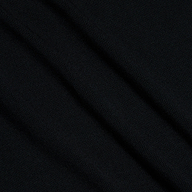 Close-up of the Shania Racerback Tank in black, showcasing ribbed knit fabric with subtle diagonal folds and a slightly visible woven texture.