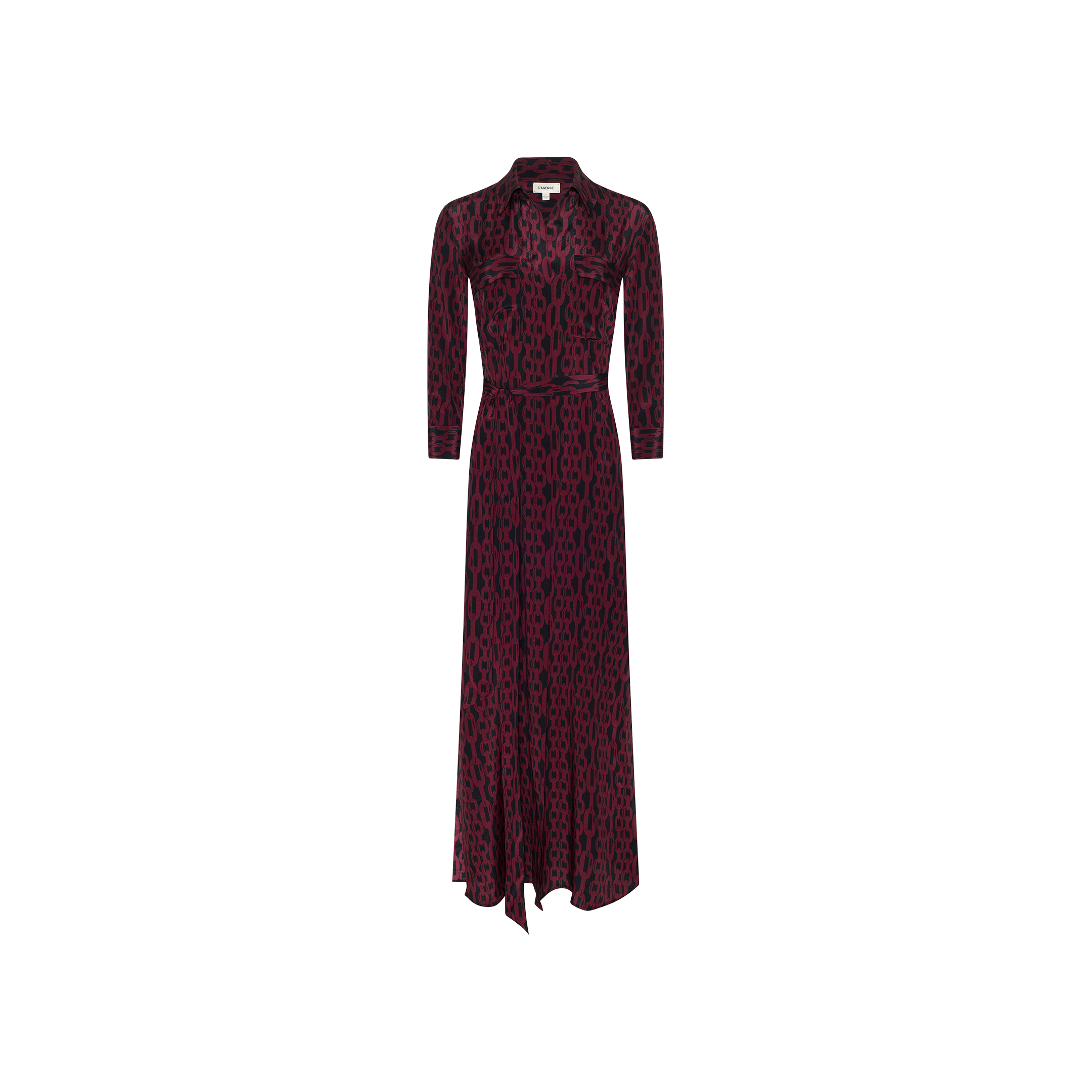 The Cameron Silk Shirt Dress is a long-sleeved, ankle-length maxi dress crafted from silk, showcasing a maroon and black geometric chain print. It features a button-down front, a collar, and a belted waist, and is displayed on a plain white background.