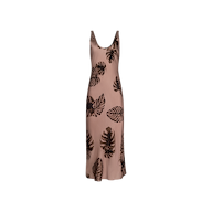 Sleeveless, light brown Akiya Satin Maxi Dress featuring a scoop neckline and black palm leaf print, cut on the bias from luxurious satin fabric, displayed on a plain white background.