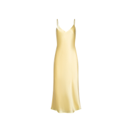 The Seridie Silk Slip Dress is a sleeveless, pale yellow slip dress crafted from luxurious silk charmeuse, featuring a bias cut and thin spaghetti straps, displayed on a plain white background.