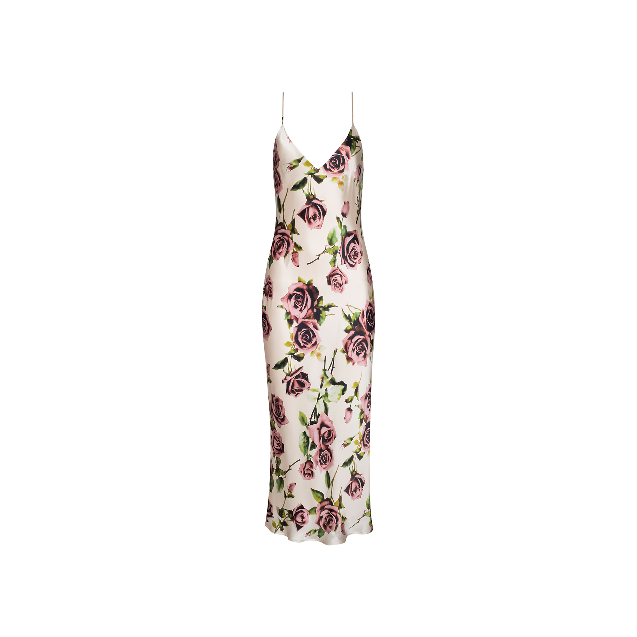 The Seridie Silk Slip Dress is a sleeveless, ankle-length slip dress with thin straps, crafted from silk. It features a white base adorned with a print of large purple and pink roses accented by green leaves.
