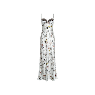 The Sayla Silk Gown is a long, white satin slip dress featuring thin straps, black lace trim on the bodice, and an all-over colorful butterfly lock print with floral motifs that evoke vintage glamour.