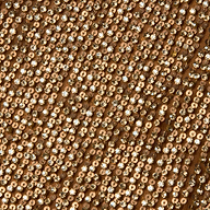 Close-up of the Paula Gown, featuring fabric densely covered in shiny gold sequins that reflect light, creating a sparkling and textured surface reminiscent of a rhinestone-adorned dress.