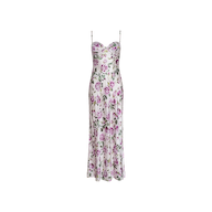 The Sayla Silk Gown is a sleeveless, ankle-length dress with thin straps and a fitted bodice, showcasing a white background adorned with a pink and green floral pattern for vintage glamour.