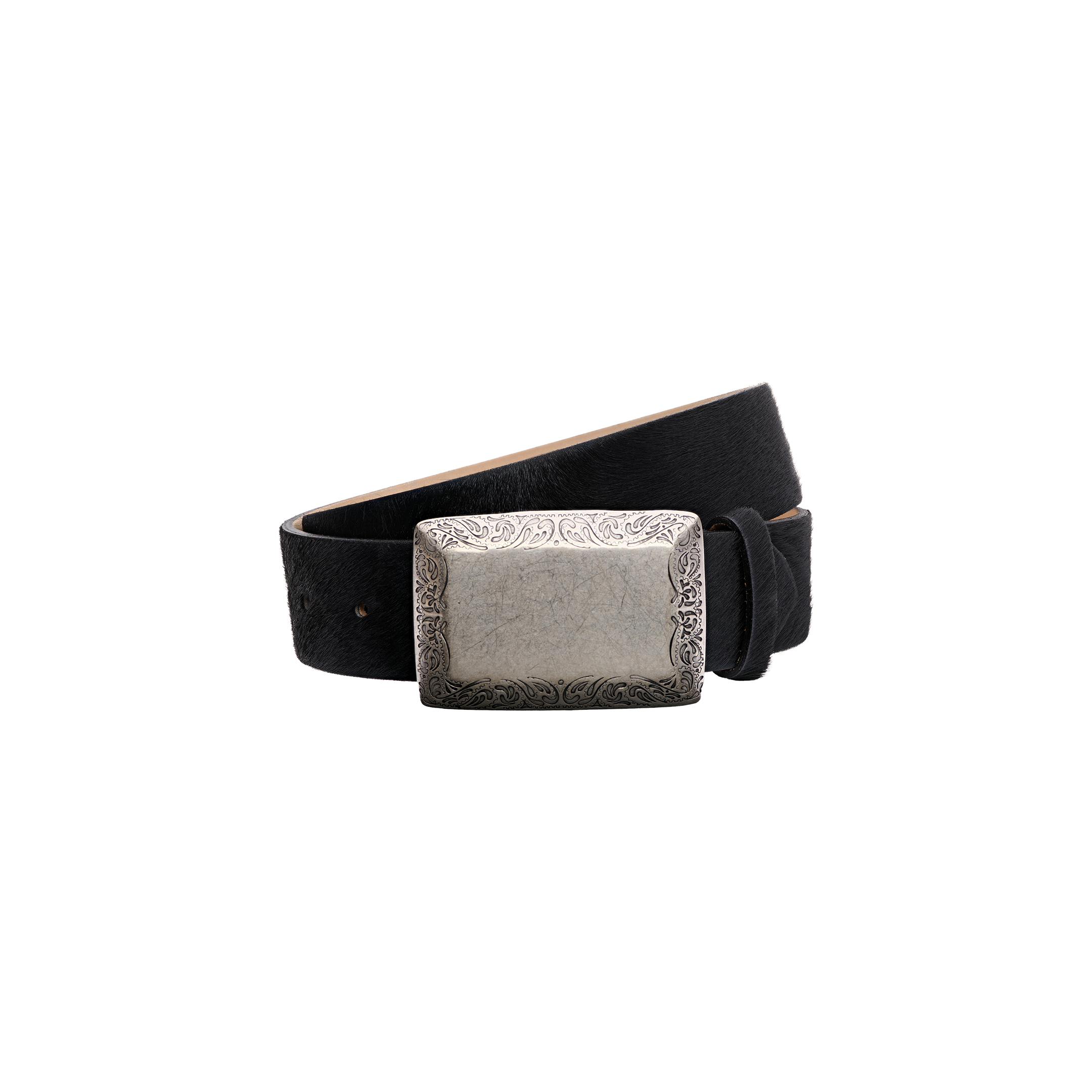 The Solera Belt is a black leather belt with a large rectangular silver buckle adorned with intricate engraved patterns, handcrafted in LA and displayed against a plain white background.
