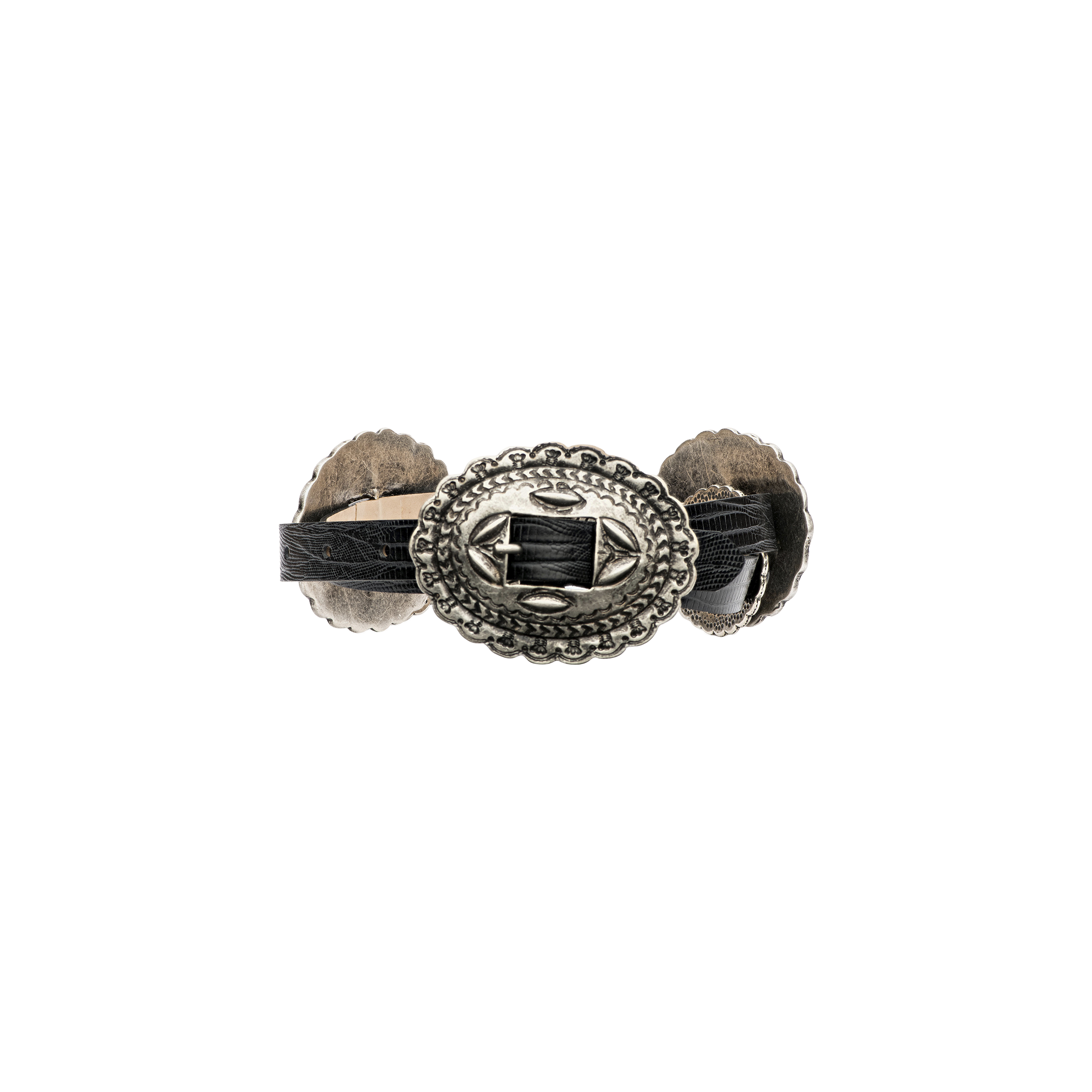 A decorative belt crafted from handcrafted Italian leather, featuring an ornate, silver-toned central medallion with intricate patterns and a black woven detail. The Rocha Leather Belt is finished with additional silver accents on each side.