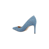 The Maelle Denim Pump, featuring a pointed toe and stiletto heel in blue denim, is displayed from the side against a plain white background.