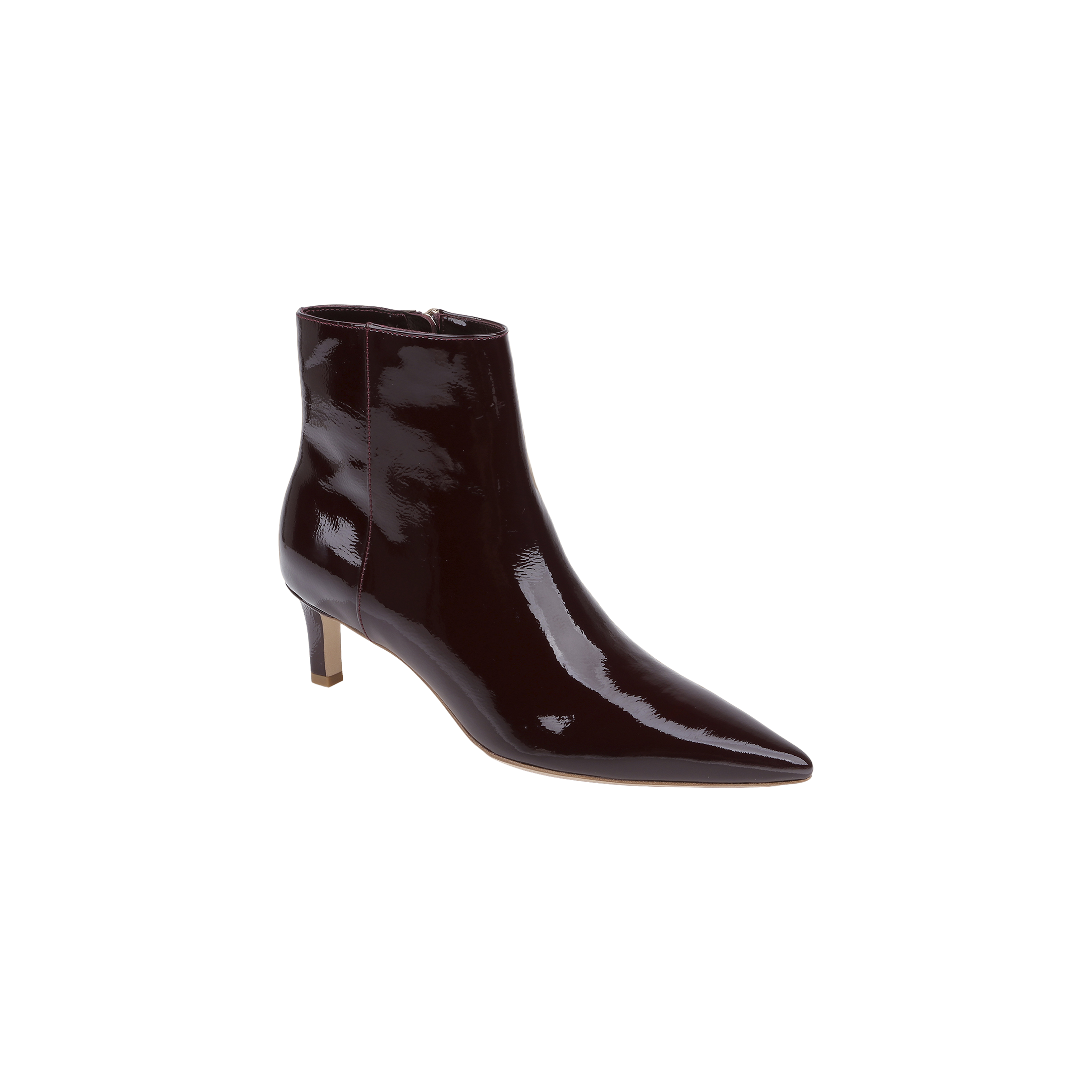 The Lilly Kitten-Heel Bootie, crafted in dark burgundy patent leather with a pointed toe and a mid-height kitten heel, is displayed on a light gray background.