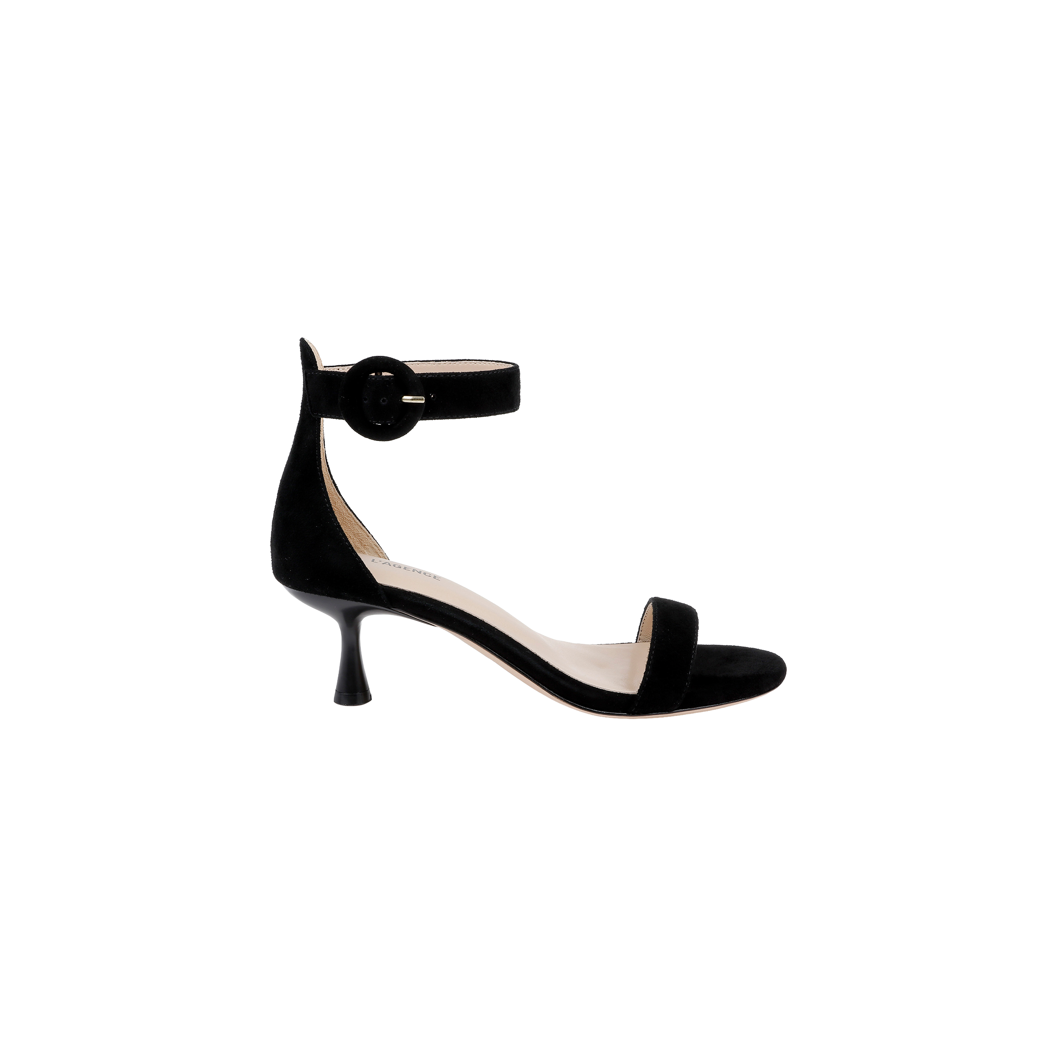 The Andelle Kitten-Heel Sandal in black suede features a flared low kitten heel, a single front strap, and a wide ankle strap accented with a large round buckle. Designed for comfort, it includes a memory foam insole. Displayed against a plain white background.
