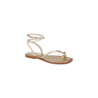 The Mariana Leather Sandal, crafted in gold lizard-embossed leather, features a toe loop and slender ankle straps that wrap and buckle above a brown sole, shown against a white background.