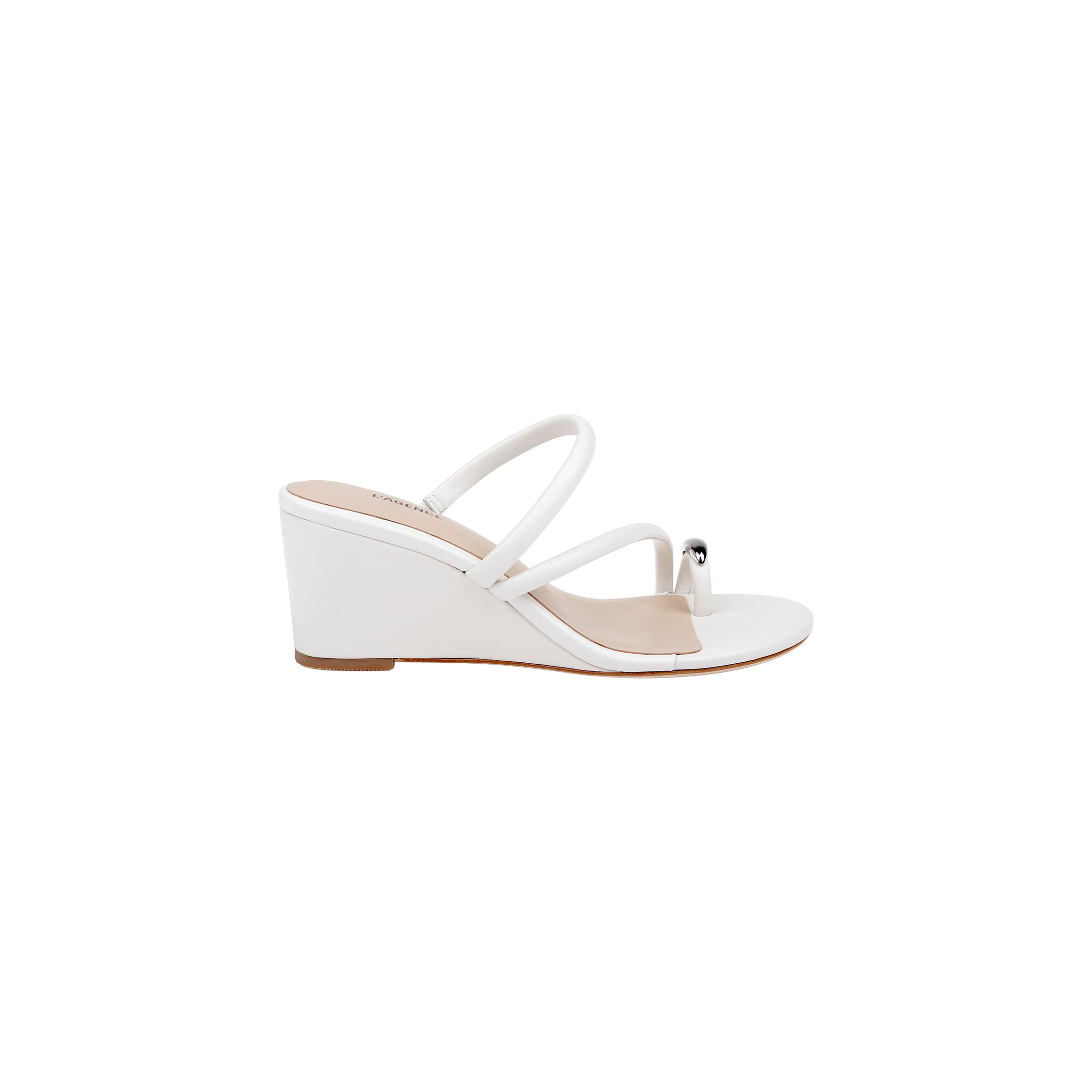 The Maritza Wedge Sandal is a white open-toe wedge featuring two thin straps and a metal-capped toe ring accent on the toe strap. Designed for comfortable support with its walkable wedge heel, it is displayed against a plain white background.