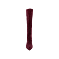 The Herald Boot, a single burgundy suede knee-high style, is pictured from above to highlight its pointed toe and side zipper, set against a plain white background—perfect for autumn.