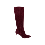 The Herald Boot, a single knee-high, pointed-toe stiletto boot in dark burgundy suede, is displayed against a plain white background.