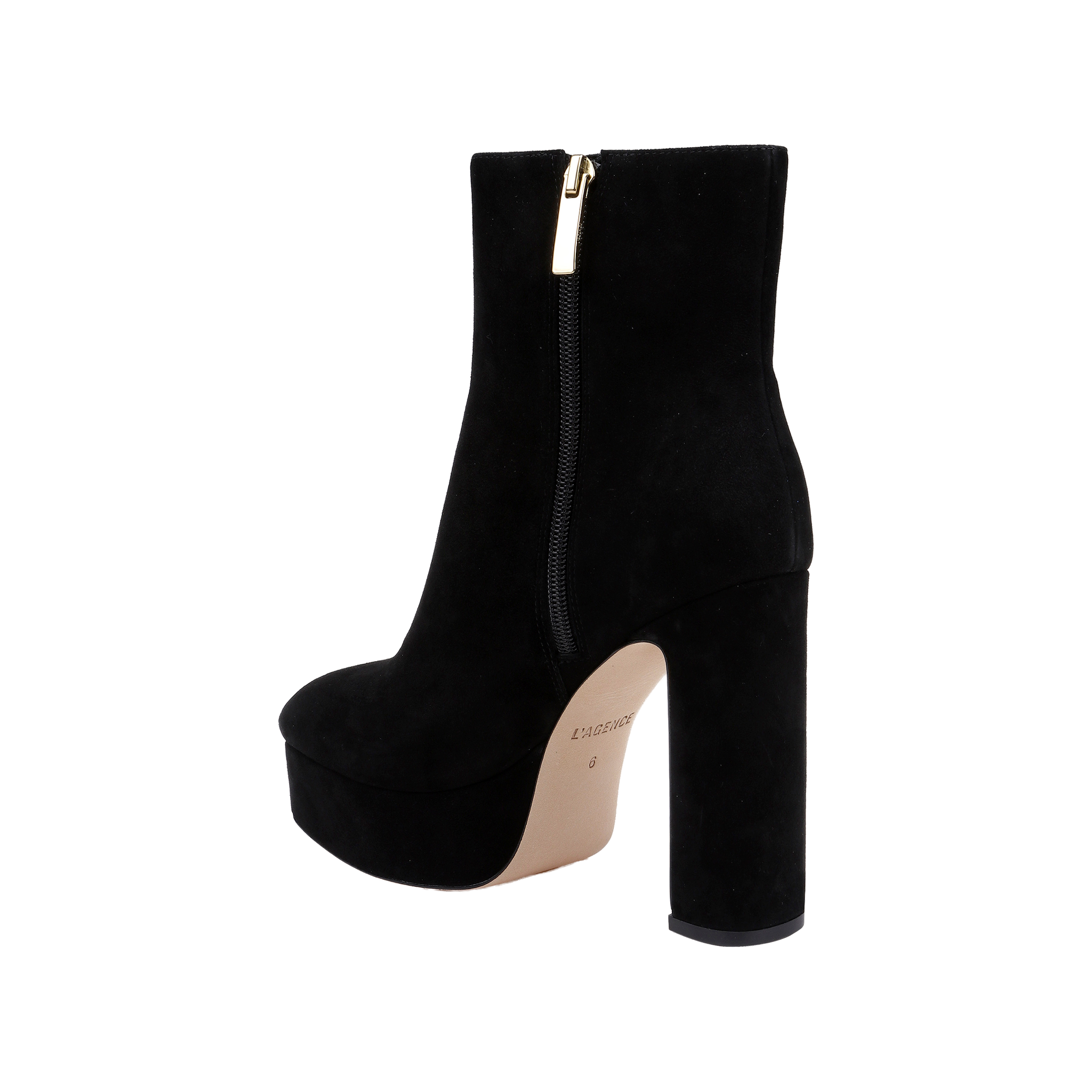 The Soho Bootie is a black suede ankle boot featuring a thick platform block heel, side zipper, and beige sole, displayed against a plain white background.