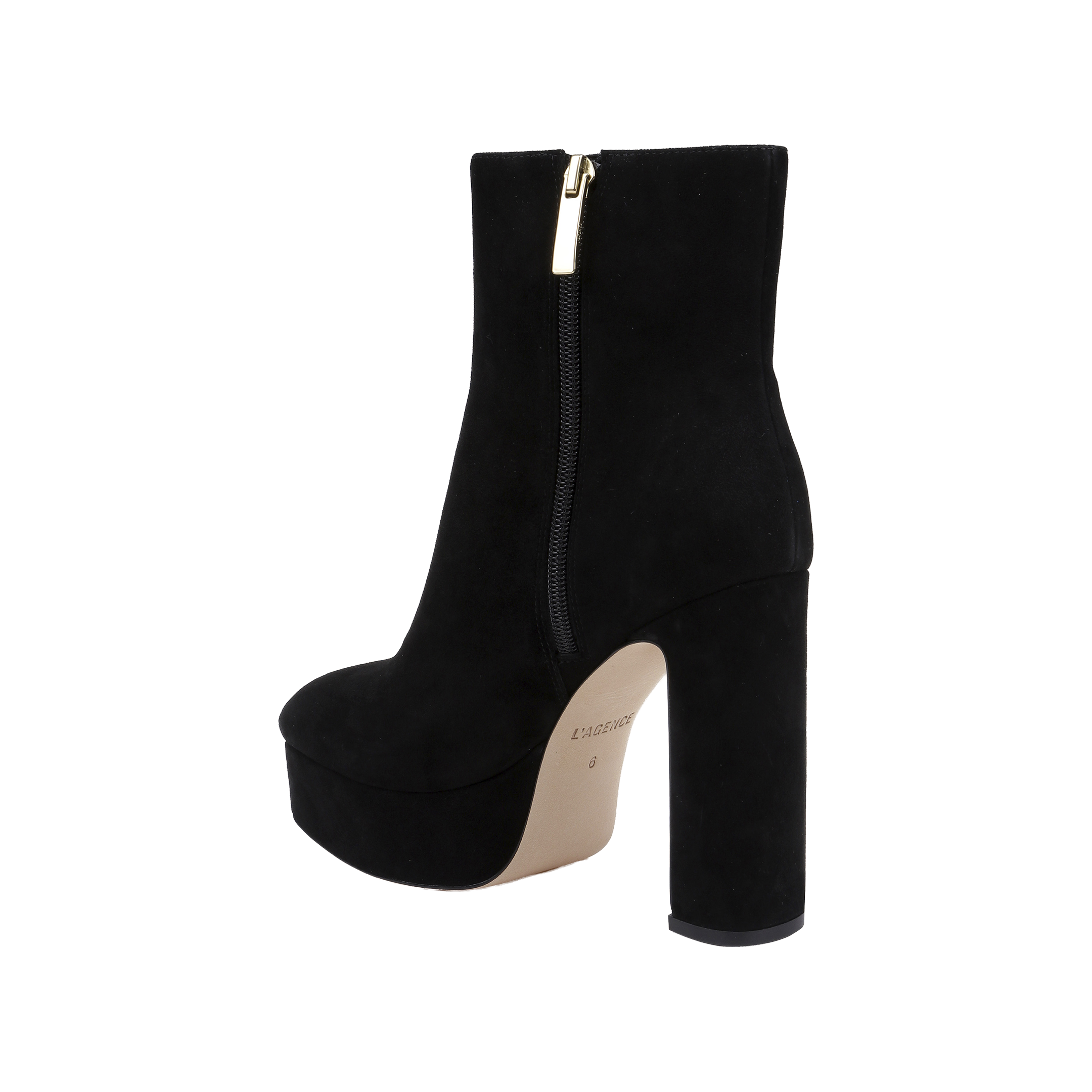 The Soho Bootie is a black suede ankle boot featuring a thick platform block heel, side zipper, and beige sole, displayed against a plain white background.