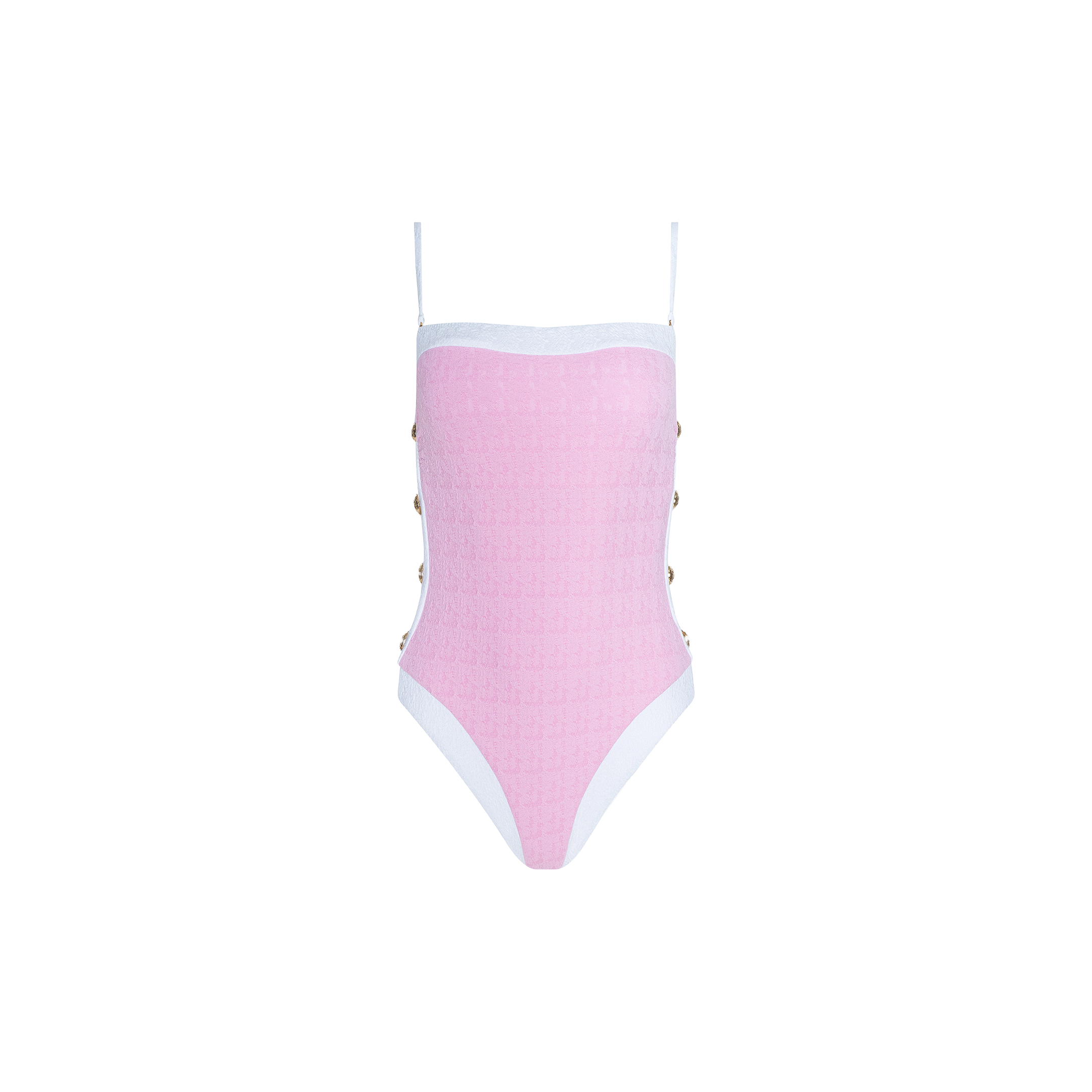 The Tory Bandeau One-Piece Swimsuit is a pink one-piece featuring thin white shoulder straps and white trim. Metallic button details decorate the sides, while textured bouclé fabric adds interest throughout. The swimsuit is photographed against a plain white background.