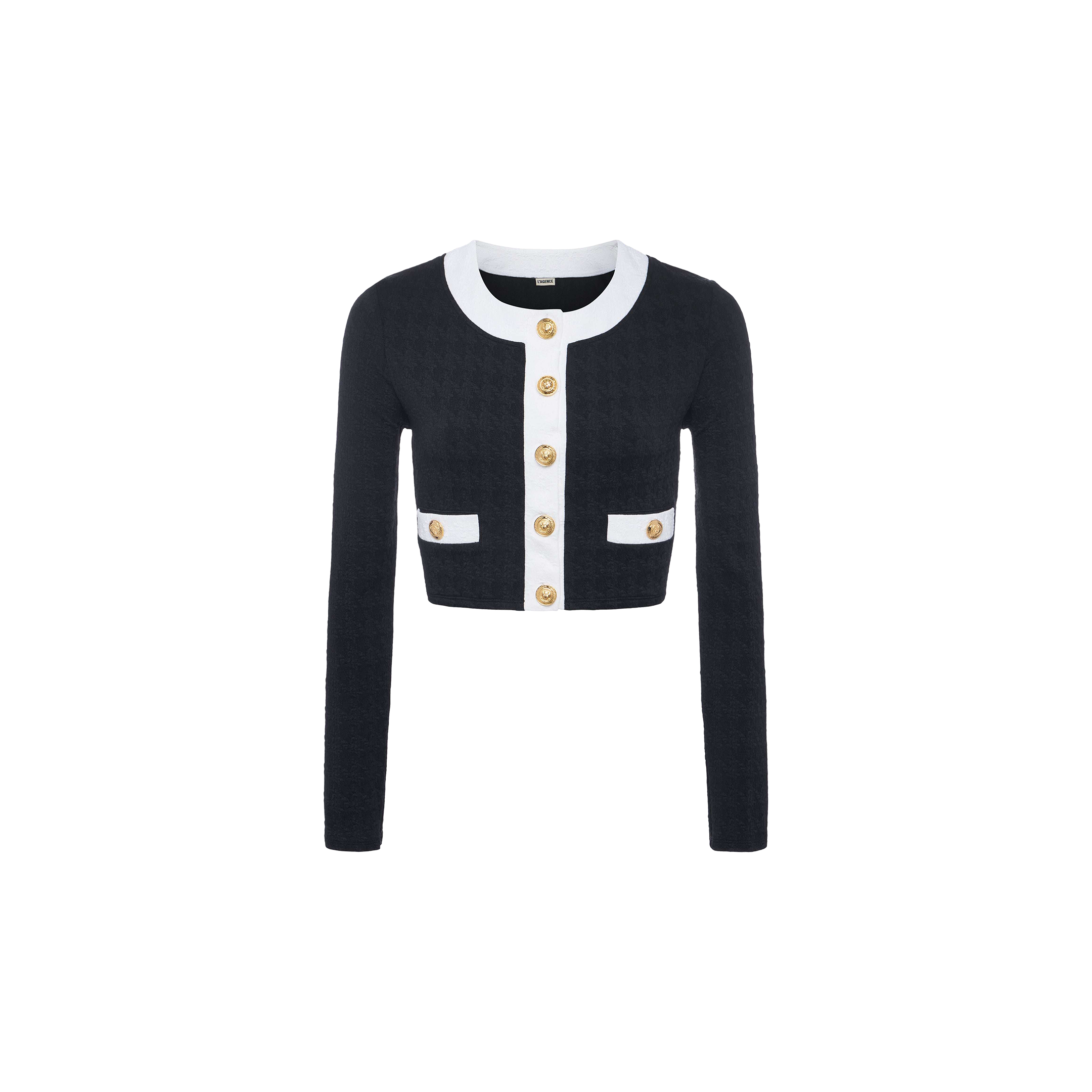 The Adaline Cardigan Cover-Up is a cropped, long-sleeve black cardigan featuring white trim, gold buttons down the front, and two front pockets. Designed as a stylish swimsuit cover-up or versatile beach-to-boat layer, it is displayed on a plain white background.