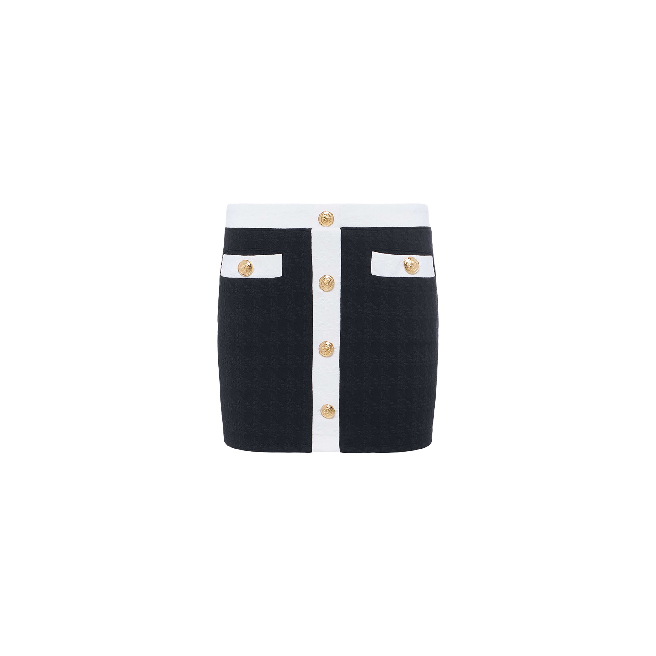 Introducing the Coco Mini Skirt Cover-Up: a black bouclé mini skirt featuring white trim, gold buttons down the front, and two front pockets accented with matching white trim and gold buttons—beautifully displayed on a plain white background.