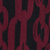 Close-up of a fabric with a repeating maroon chain-link pattern on a black background.