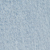 Close-up of a light blue textured surface, resembling soft fabric or paper with a subtle speckled pattern.