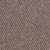Close-up of a textured surface with a mix of small pink, purple, and gray specks, resembling rough fabric or a granular material.