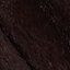 A close-up of a dark brown textured surface with subtle lighter specks scattered throughout.