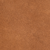 A close-up image of a textured brown or orange surface, resembling leather, suede, or a soft fabric material with a mottled appearance.