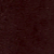 A close-up image showing a dark brown, textured surface.